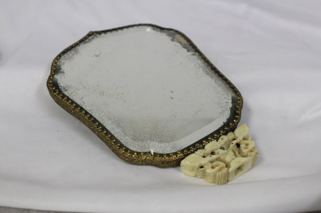 An Antique Jade Inlaid With Bone Chinese Mirror: handle is missing - some silvering - 7 1/2" long vertically