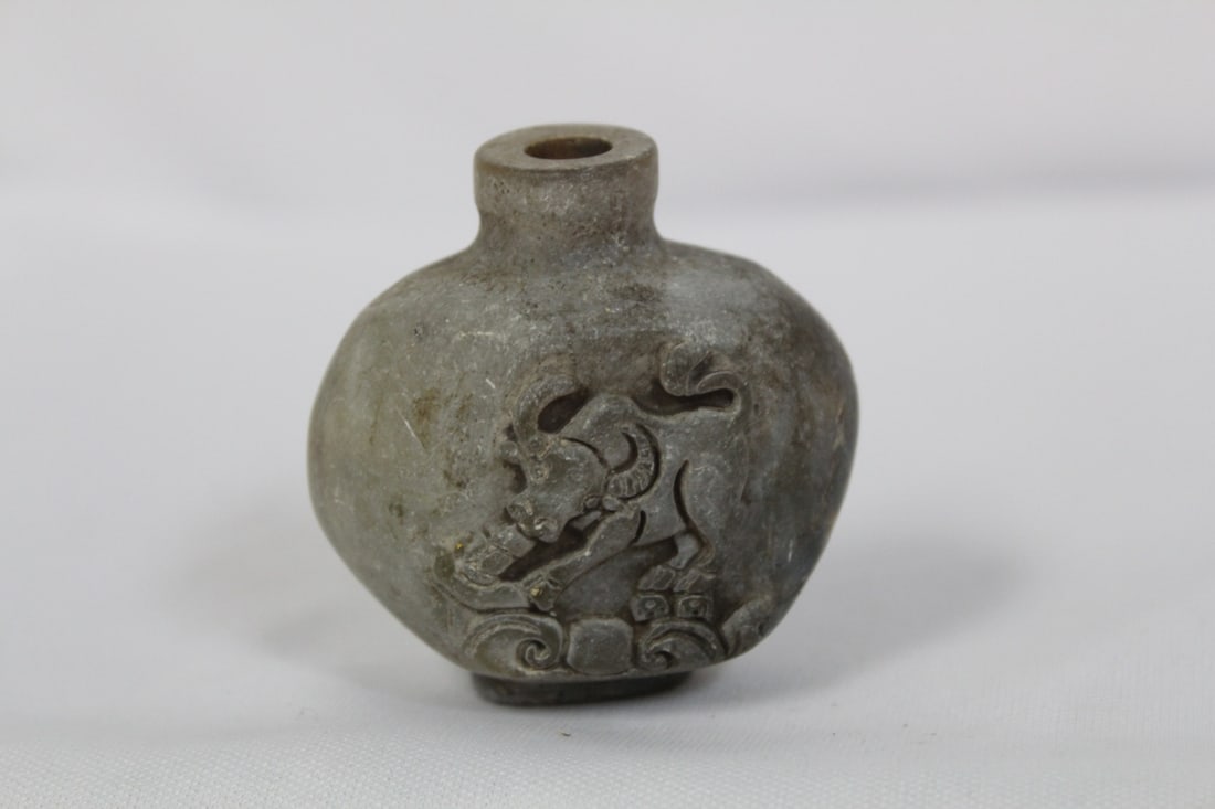A Well Carved Stone Snuff Bottle: no stopper