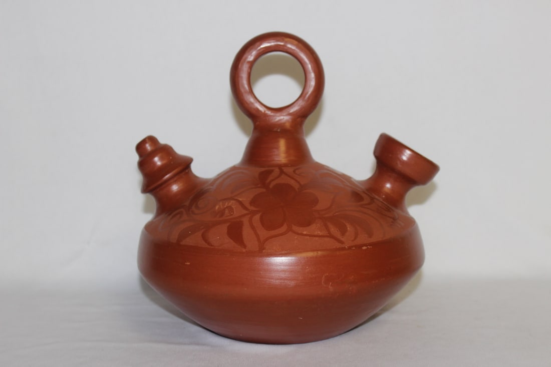 A Hand Signed Pottery Vessel: most likely Spanish - exact age or creation unknown - 9 inches tall - good looking vessel