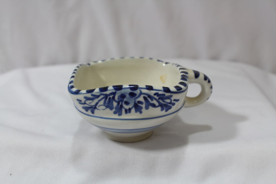 A Delft Cup: 2" tall
