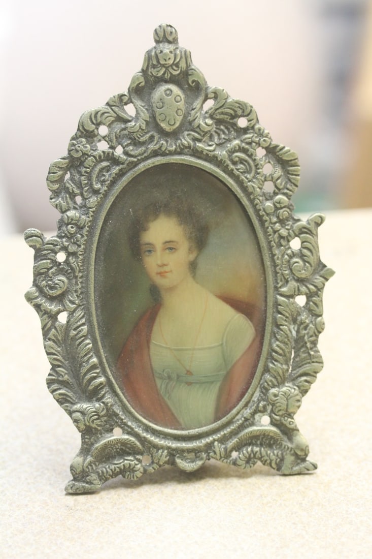 Hand Painted on Wood Portrait: inside an ornate brass frame - overall= 5 5/8" tall
