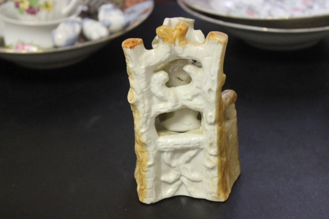 A Seated Ceramic Figure - 3