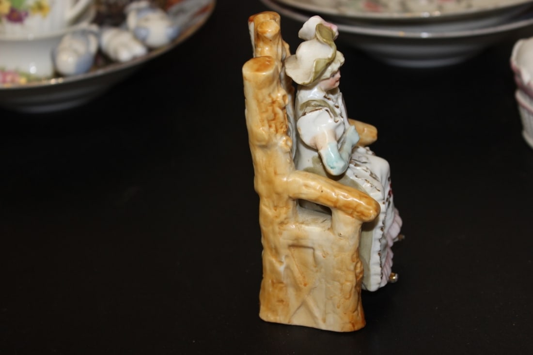 A Seated Ceramic Figure - 4