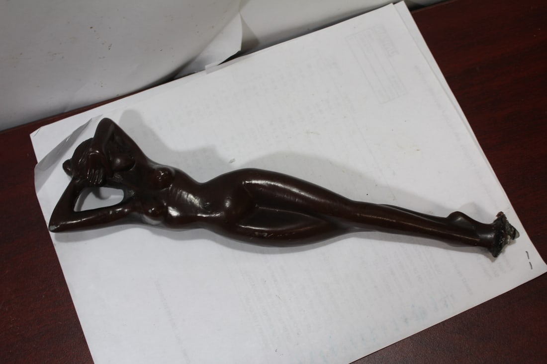 An Art Deco Metal Nude: please note: missing a base - 11 1/4" tall