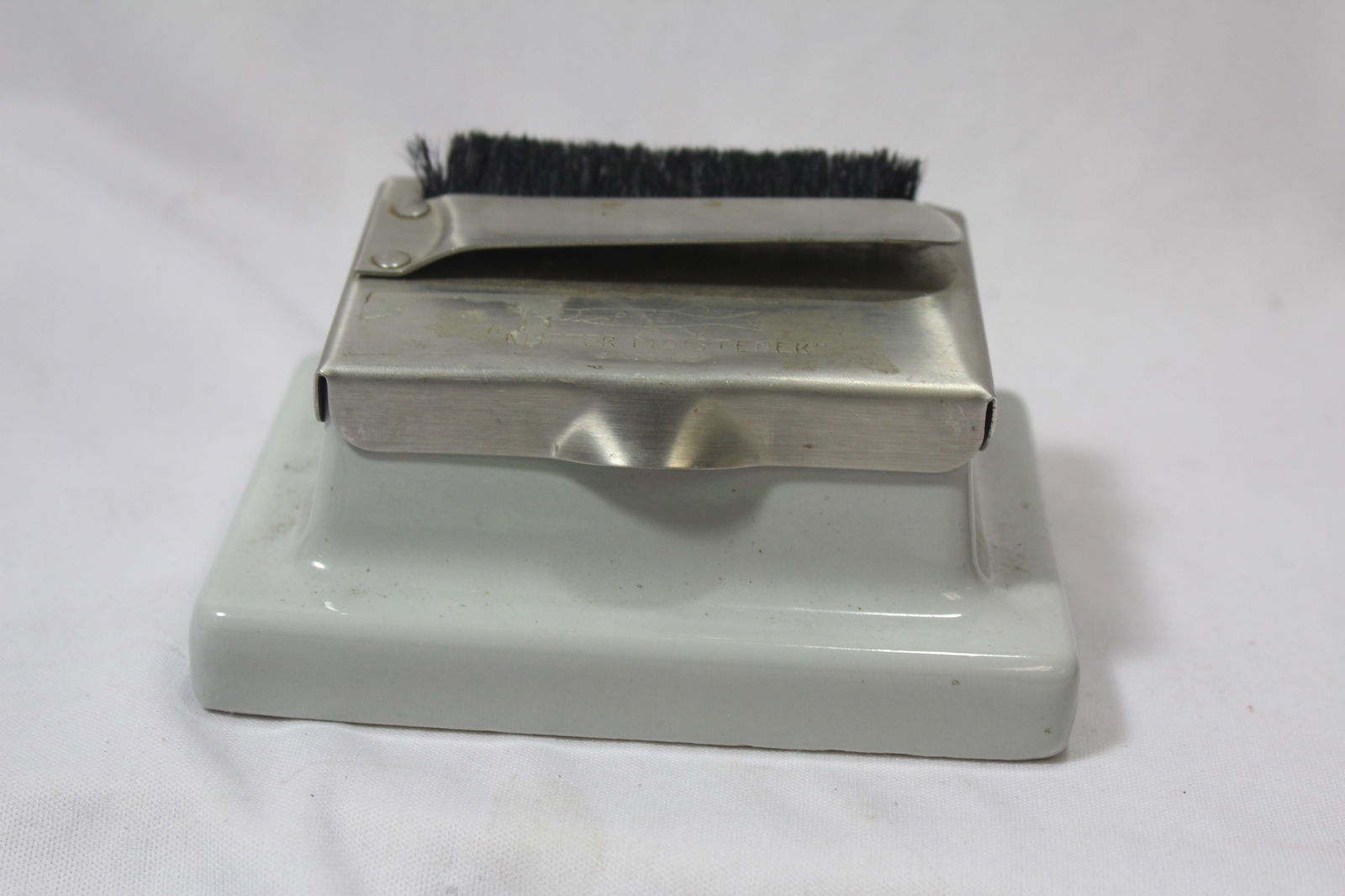 A Vintage Stamp Dispenser Labeler: as shown