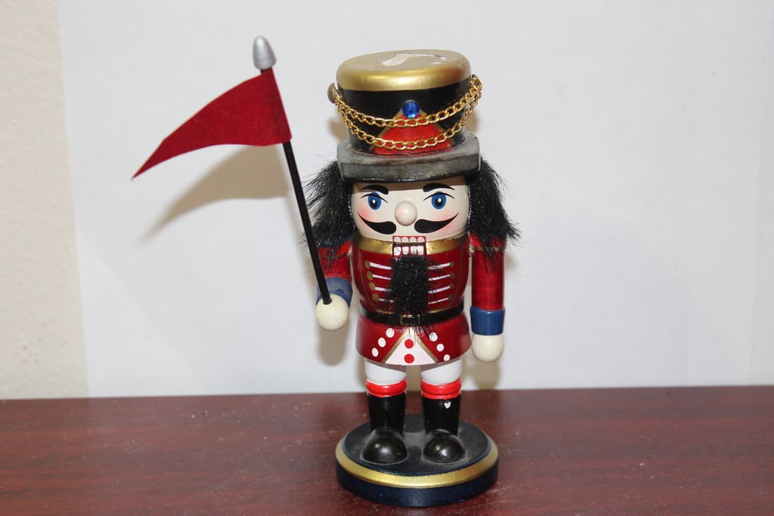 A Nut Cracker: please note: paint loss on top - 6 inches tall
