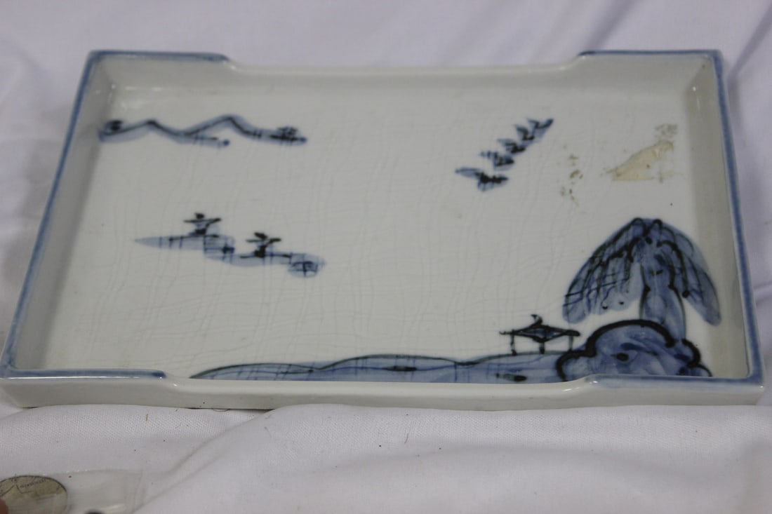 An Asian Blue and White Porcelain Tray: marked on the bottom - 9 1/8" x 6 1/8"