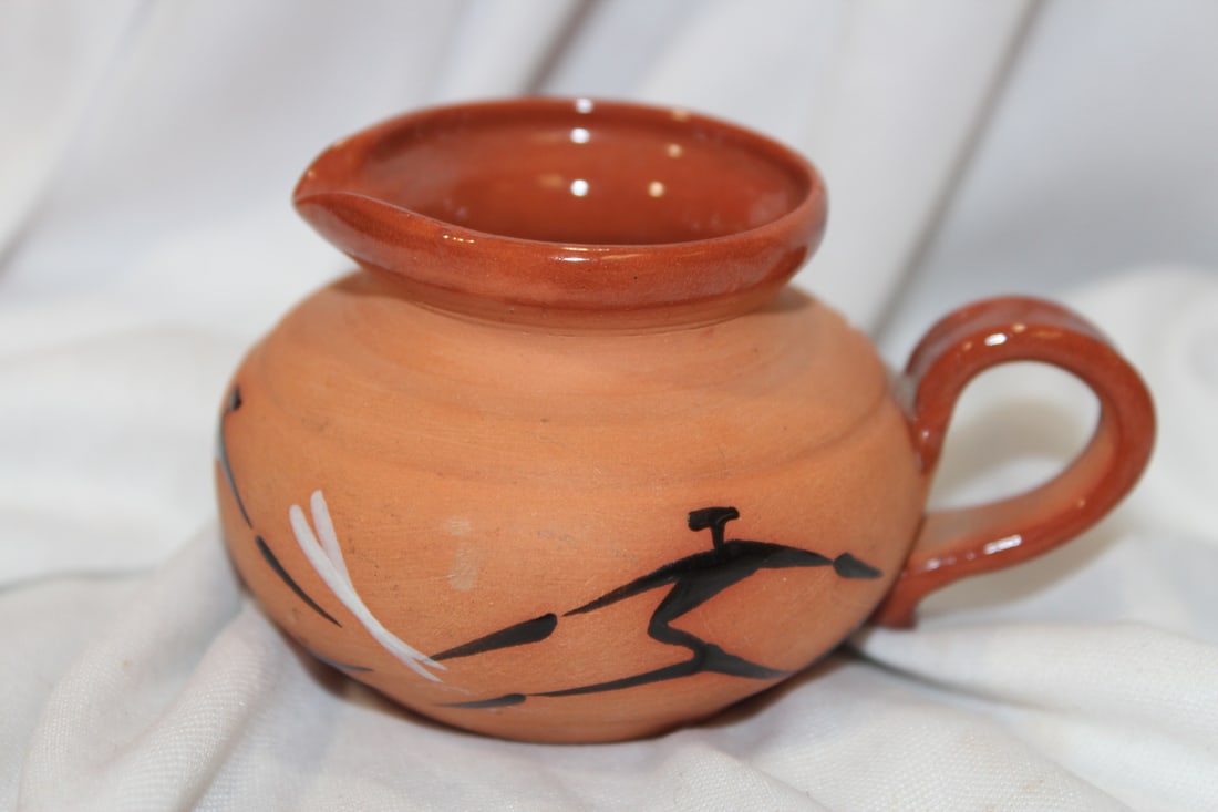 An Art Pottery Creamer: 2 inches tall