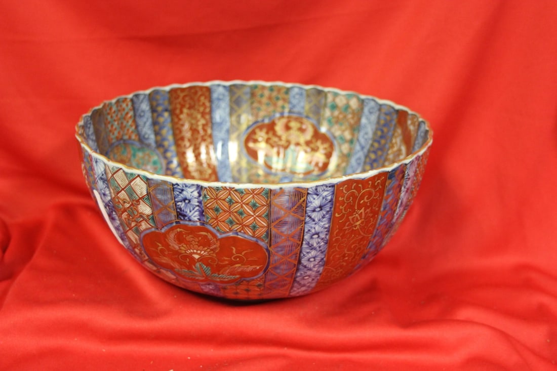 An Antique Imari Bowl: 19th century - nicely decorated - 10" in diameter and 4 3/4" tall