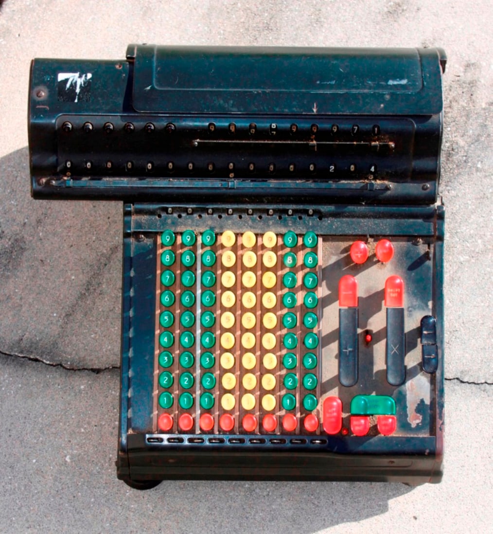 Merchant Calculator: Electrical with cord. Most likely early 1900s. Not sure how it works, but vibration is felt when it is plugged in.