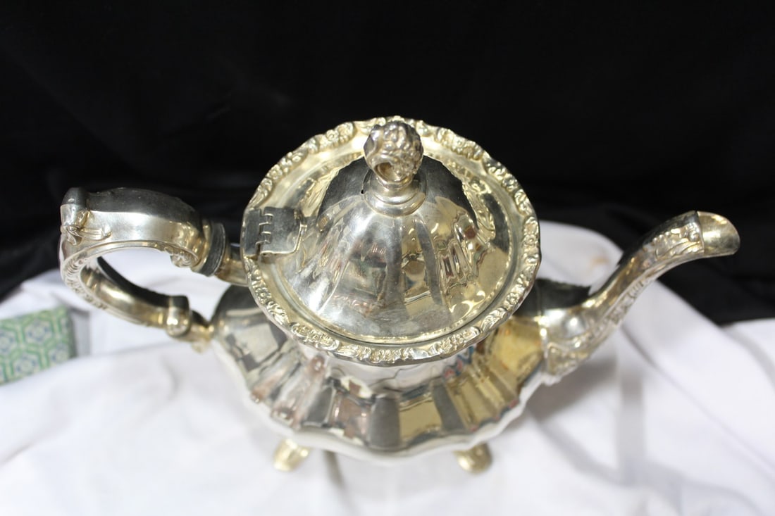 A Silverplated Teapot - 13