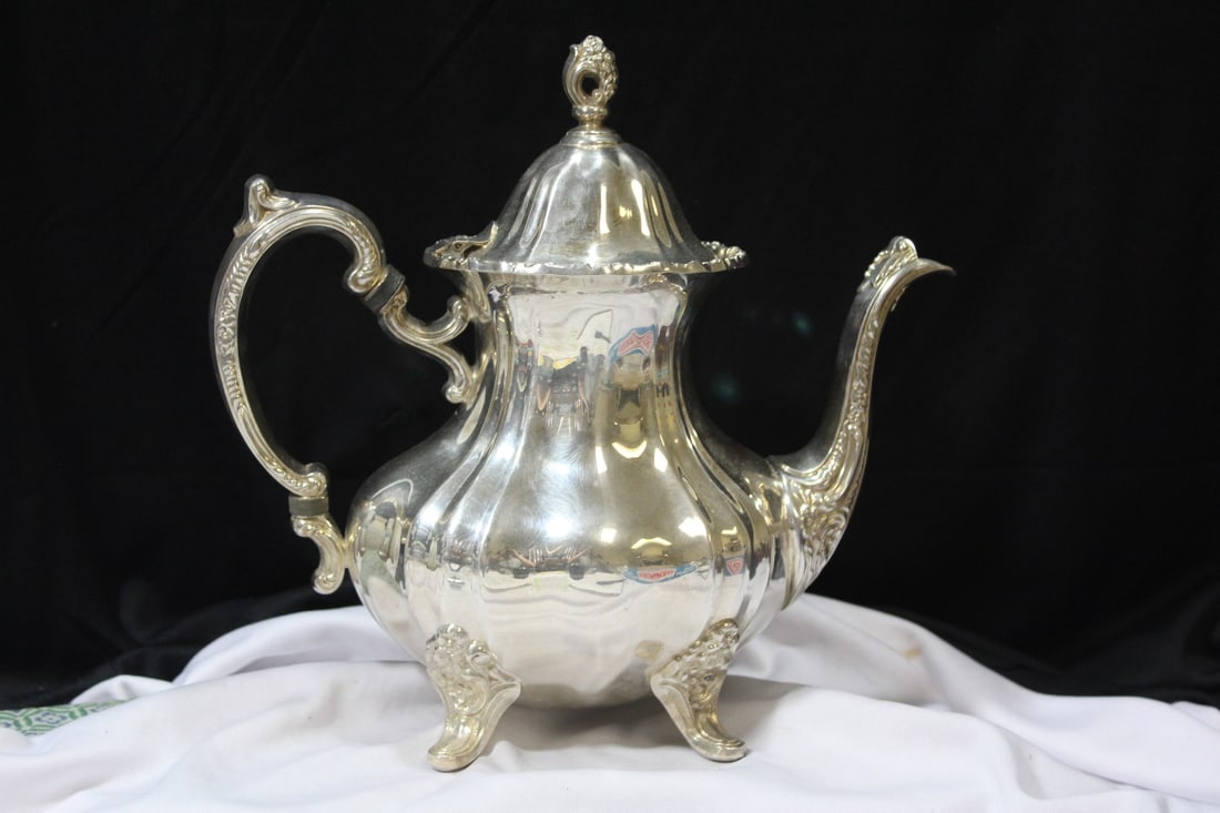 A Silverplated Teapot - 6