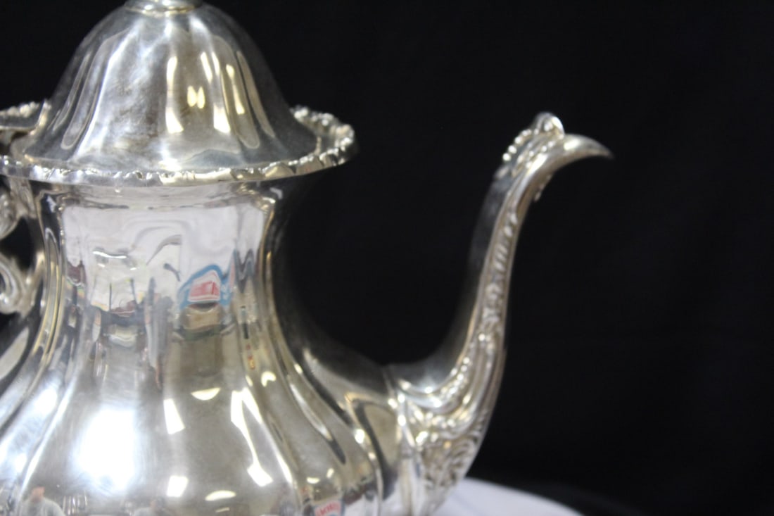 A Silverplated Teapot - 8
