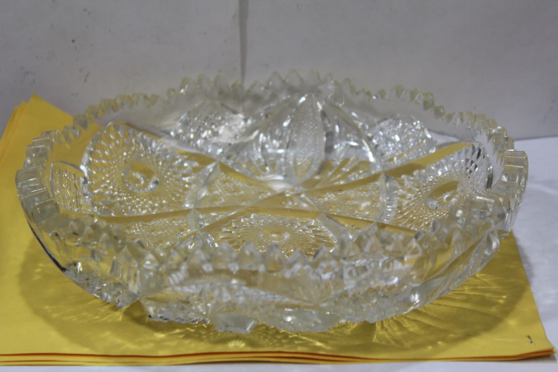 A Cut Glass Bowl: please note= minor roughness on the edges, but hardly noticeable - 9 1/2" in diameter
