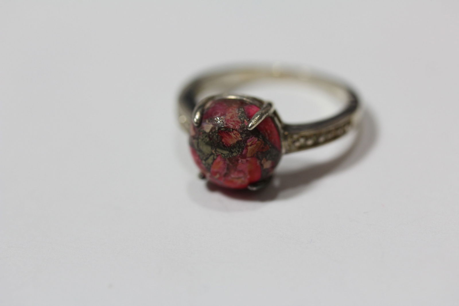 A Sterling and Red Stone Ring: as shown