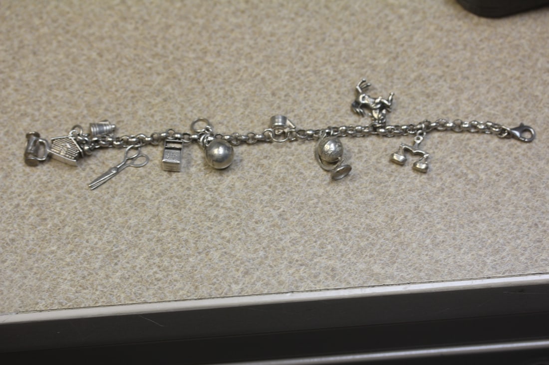 Charm Bracelet: with 10 charms - sterling or 800 silver