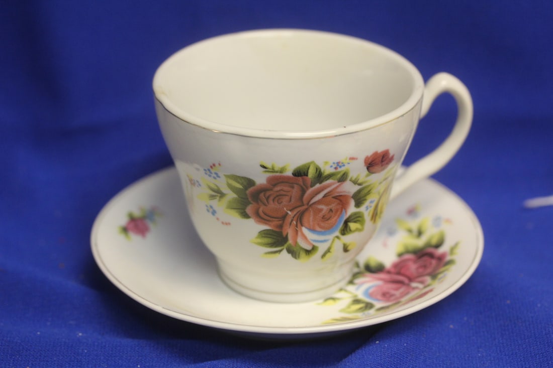 Unmarked Cup and Saucer: cup= 3 1/2" in diameter