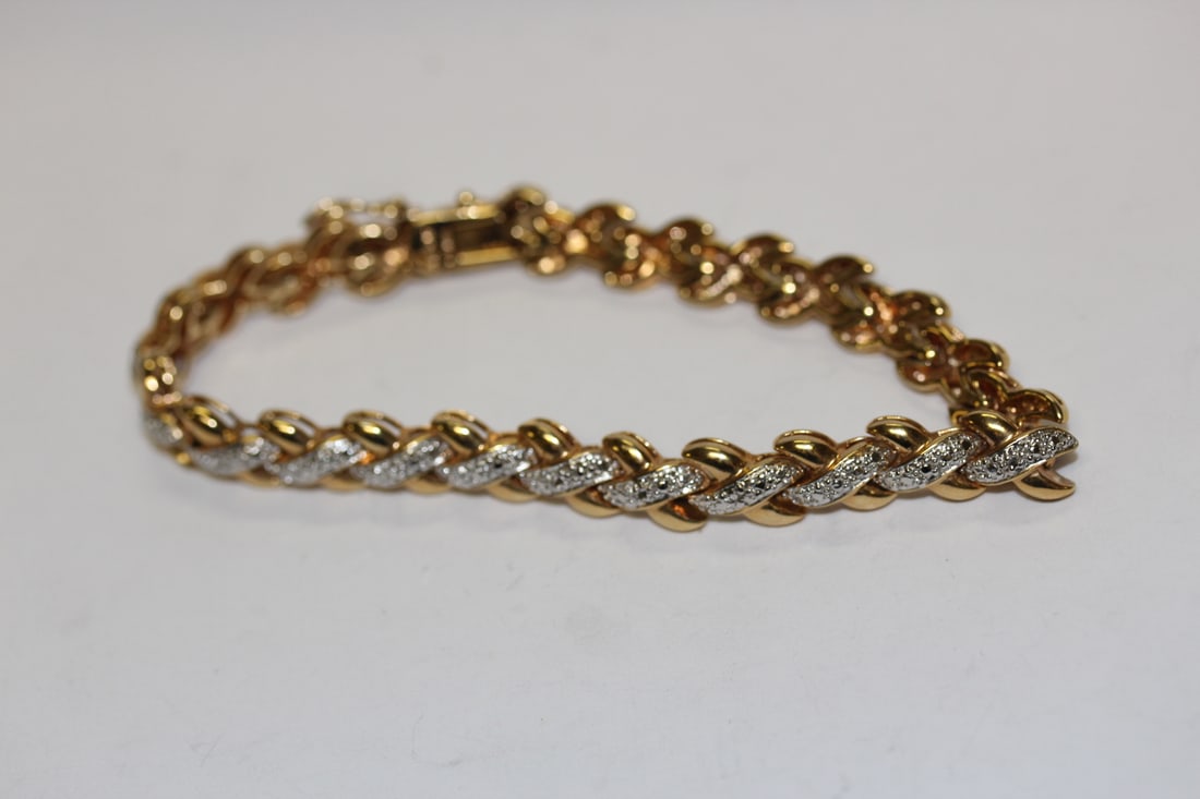 A Sterling Bracelet: gold plated on sterling - 3 3/4" when clapsed