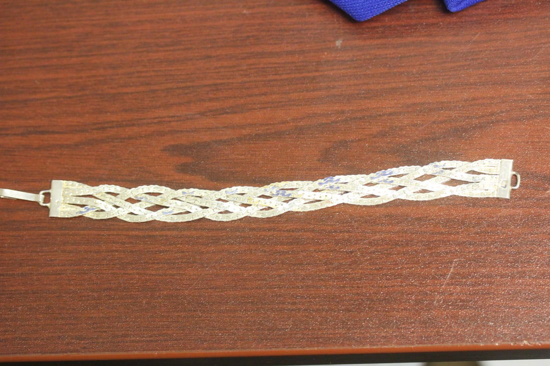 A Sterling Bracelet: 6" long unclapsed