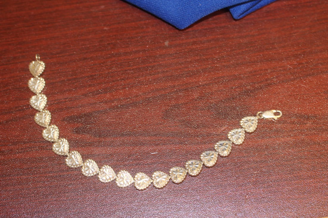 A Sterling Bracelet: 7 3/8" long unclapsed