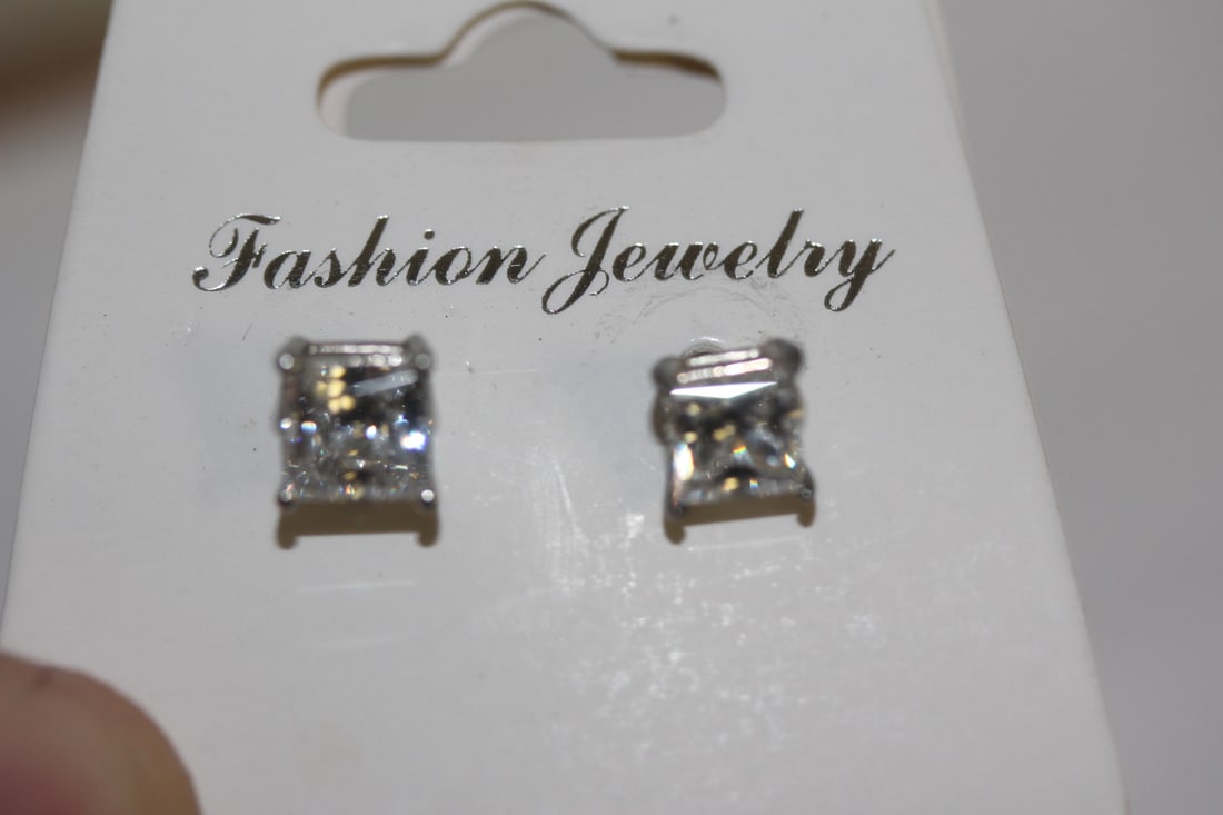 Pair of Sterling and Cz Earrings: as shown