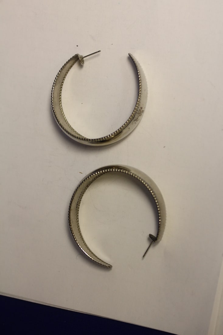 A Pair of Costume Earrings: as shown