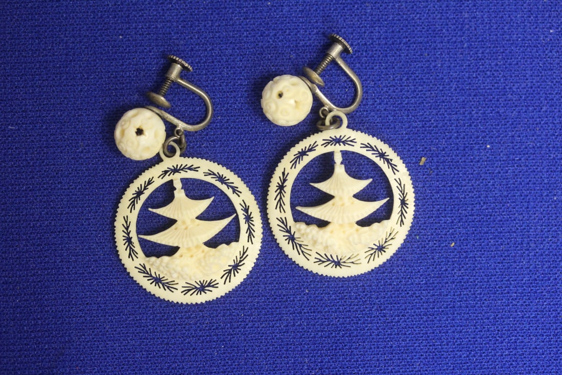 A Pair of Chinese Bone Earrings: as shown