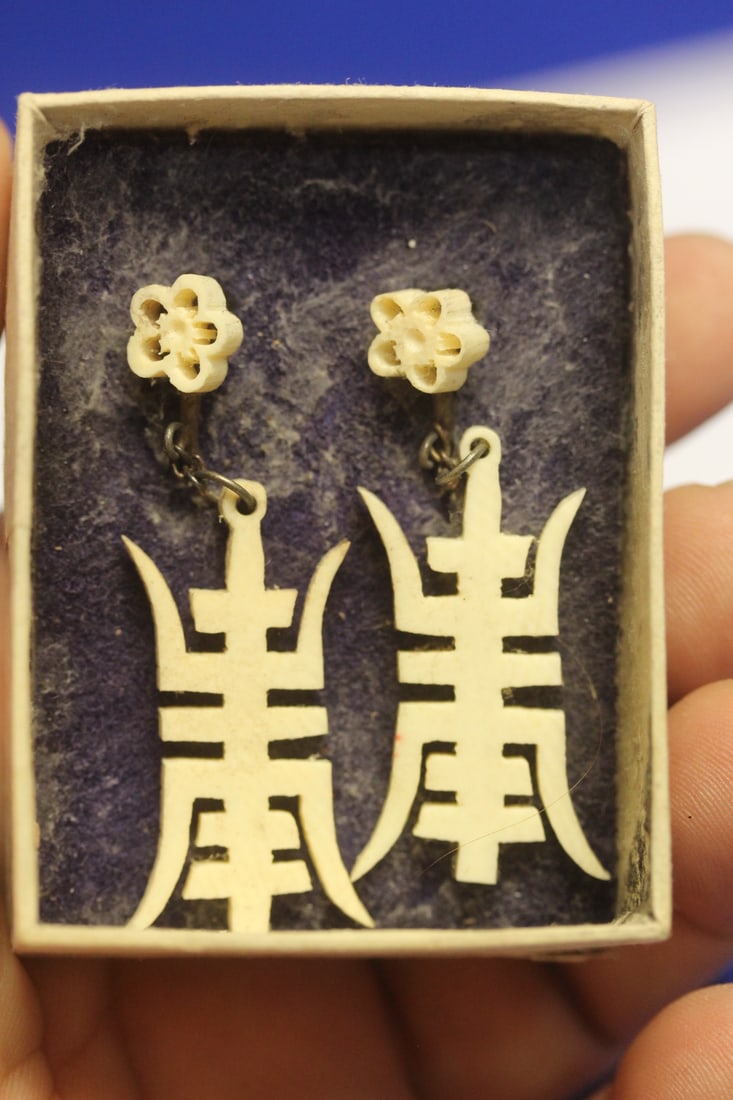 A Pair of Chinese Bone Earrings: as shown