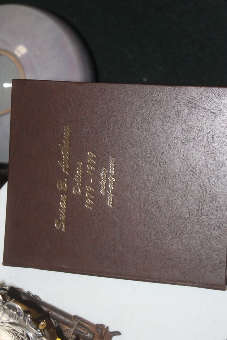 Susan B Anthony Dollars Binder: with coins - not completely full - total 11 coins