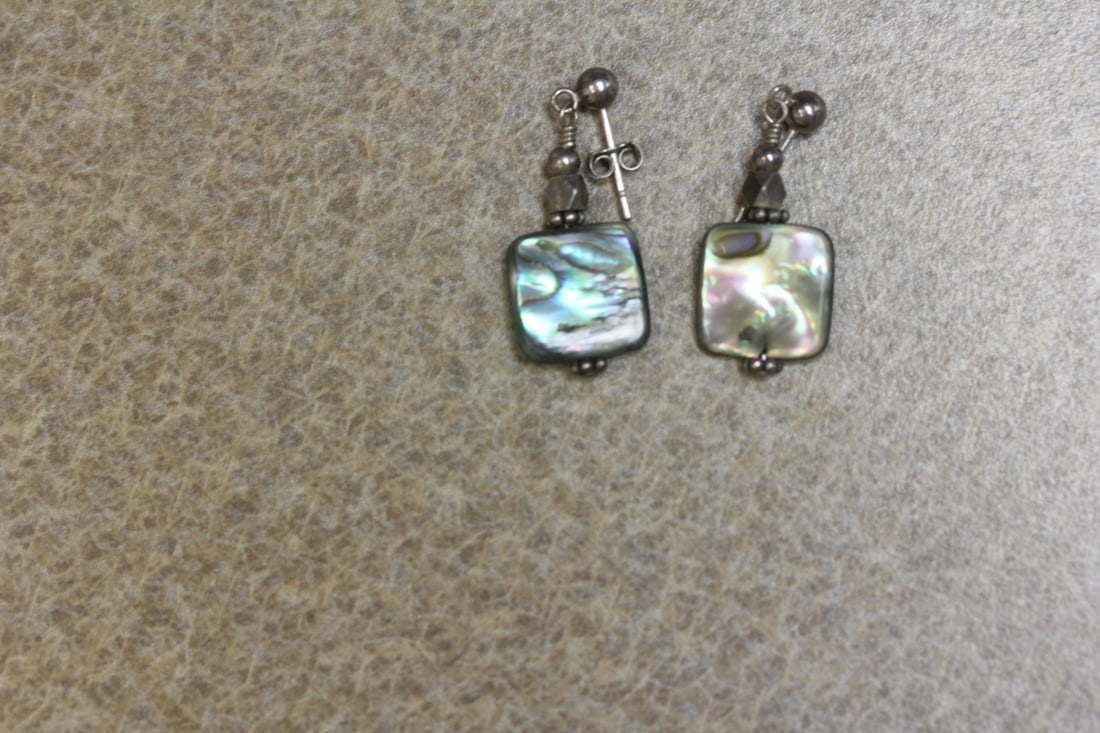 Pair of Sterling and Mother of Pearl Earrings: please note: one missing the back
