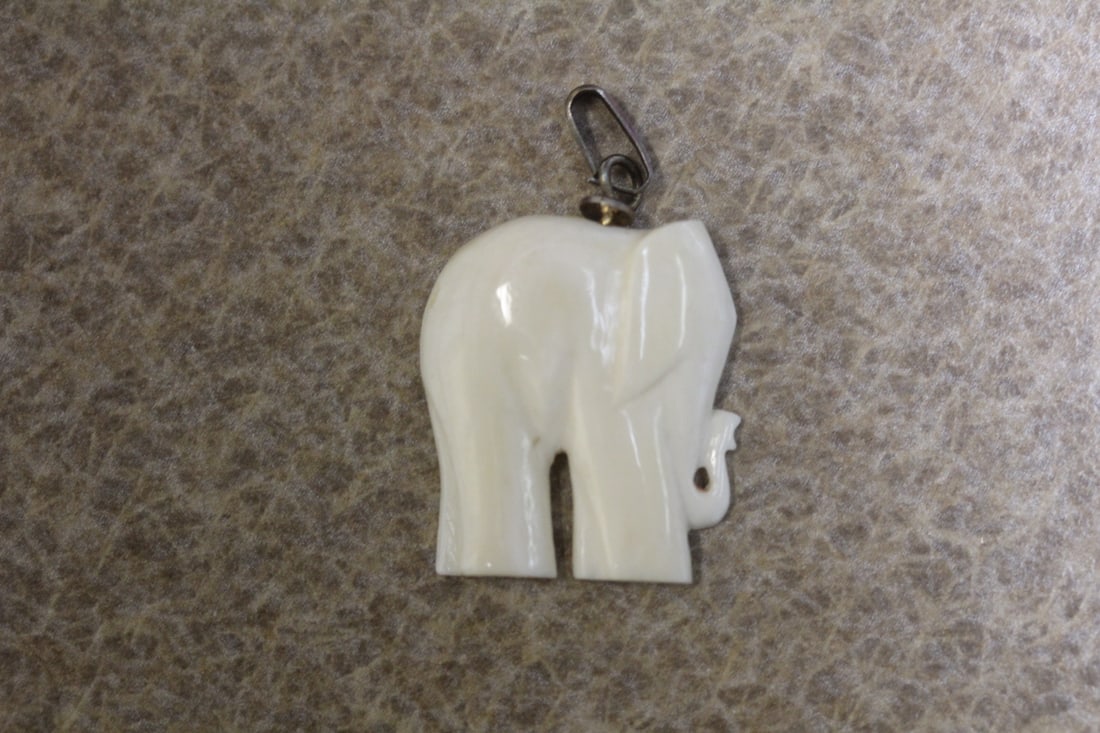 Carved Bone Elephant Pendant: bail= sterling