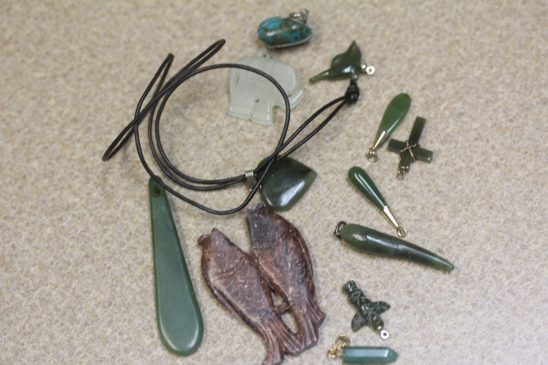 Lot of Jade Articles: to include single earrings, pendants - please note: fish pendant missing one fin