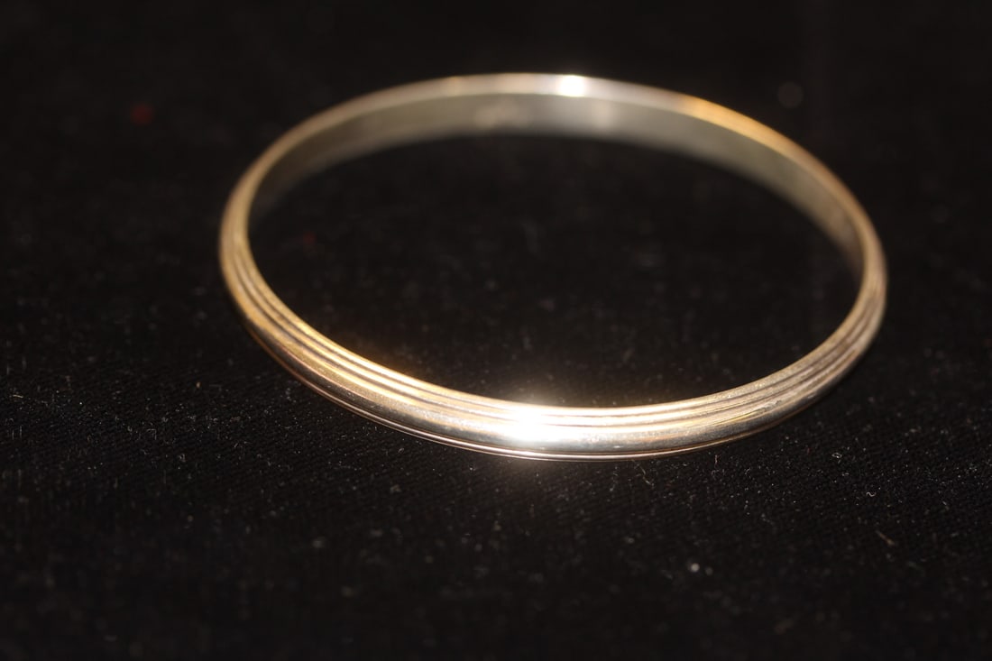 Sterling Bangle Bracelet: marked - appeared to be well made - inside diameter= 2 1/2"