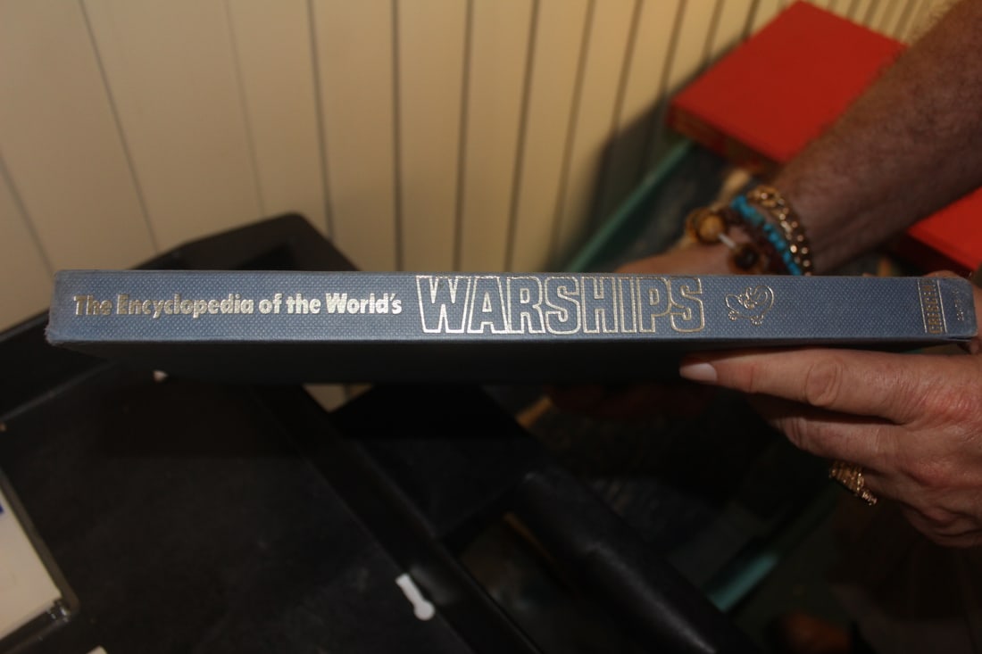 Hardcover Book on War Ships: as shown