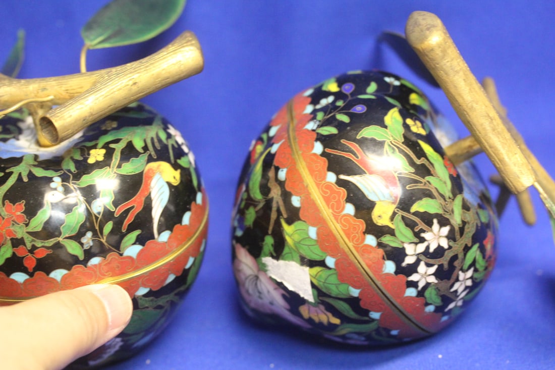 Pair of Cloisonne Boxes in Peach Form: please note: one box have some minor bruises as shown - approximately 4 inches tall
