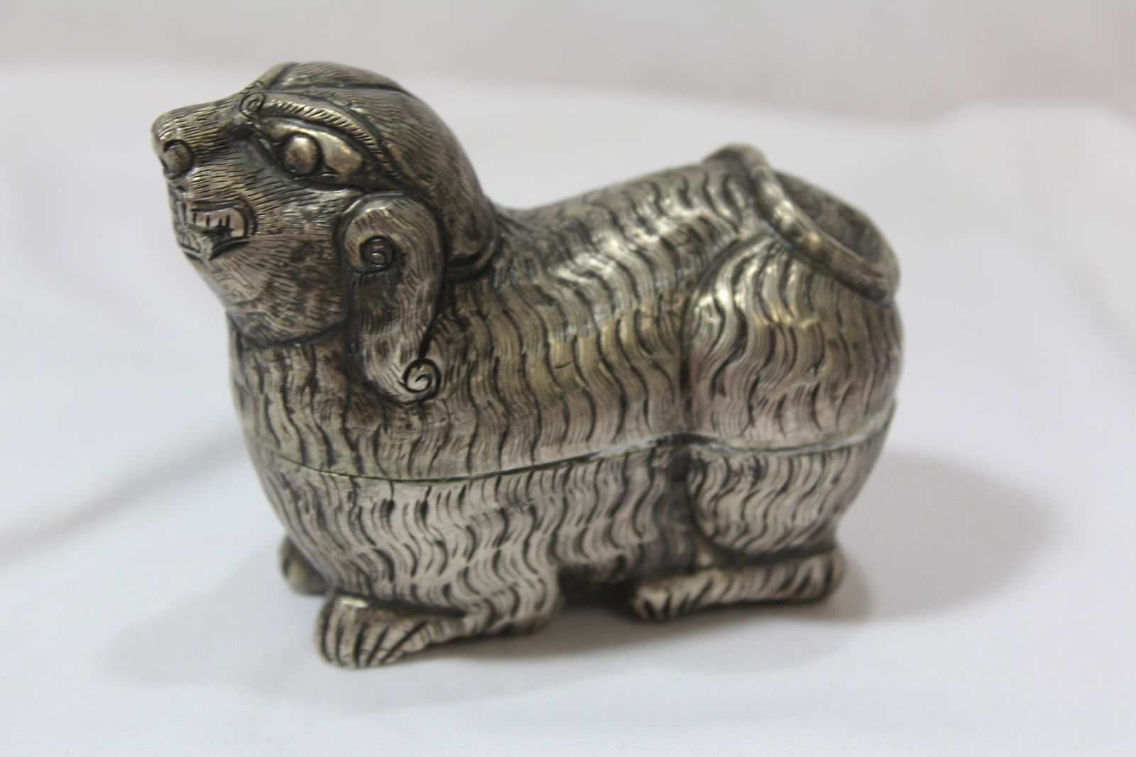 A Coin Silver Ram or Dog Box: Very nicely carved - most likely oriental - 4" long