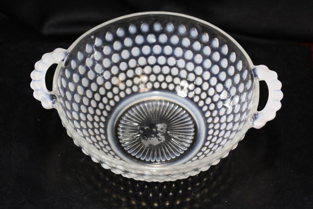 A Hobnail Glass Bowl: 7 1/2" across including the handles- please note: one appears to be a manufacturer's defect