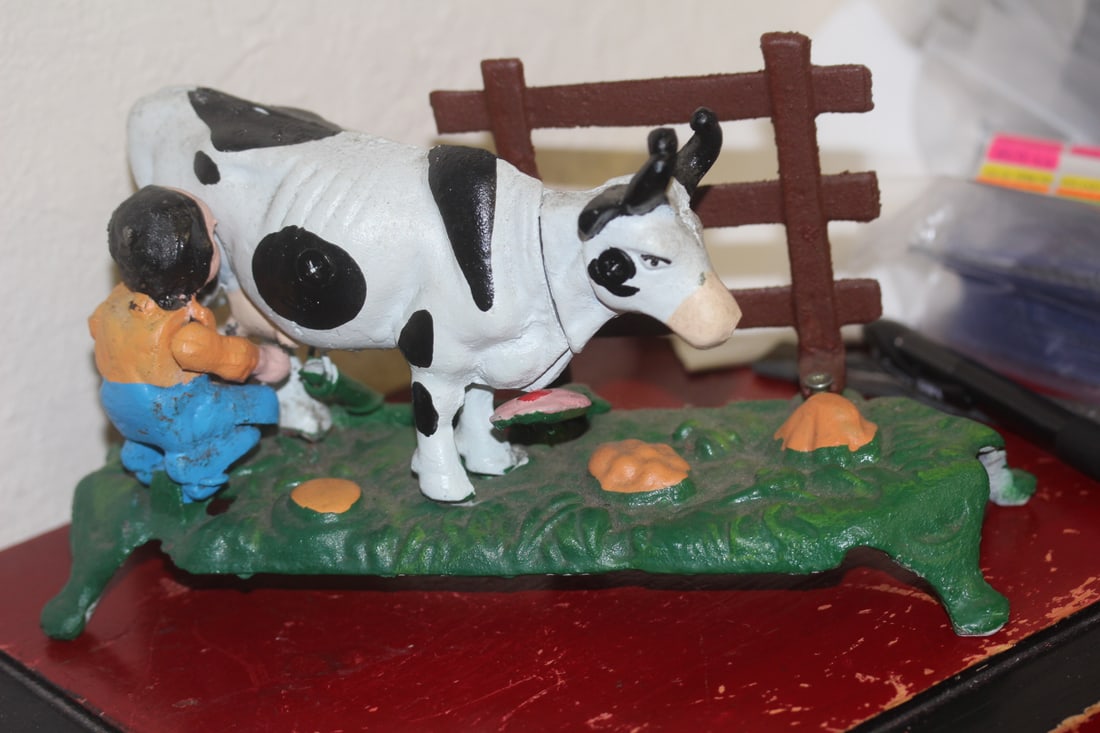 Cast Iron Mechanical Bank: 9 inches across