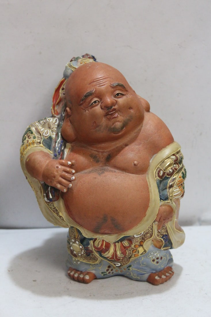 A Japanese Kutani Buddha Figurine: 7 inches tall - vintage