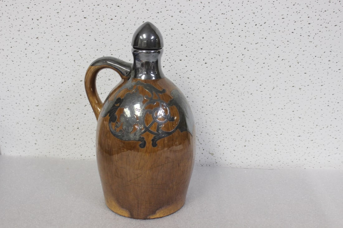 A vintage Sterling Overlay Musical Jug: with lid - works - plays: Little Brown Jug - 9 3/4"