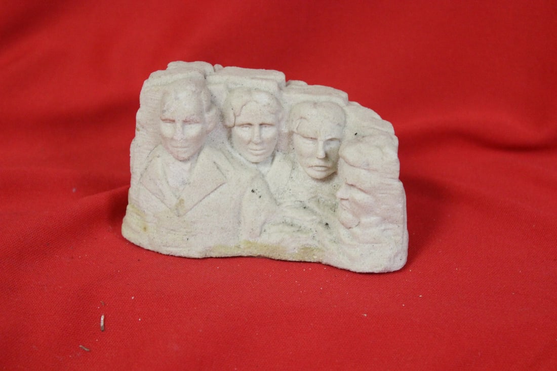 A Cement Mount Rushmore: 3 3/4" long
