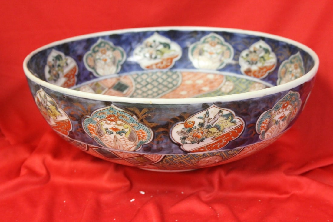 A Japanese Imari Bowl: please note: one tight hairline as shown -19th century - 12" in diameter
