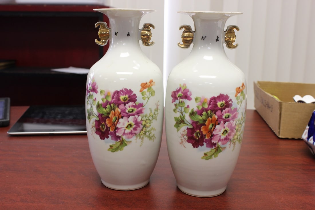 A Pair of Chinese Vase: Early 20th century - please note: one has a chip - one of them marked China - 10 1/4" tall each