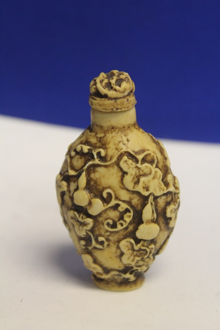 A Carved Resin Snuff Bottle: 3 1/2" tall