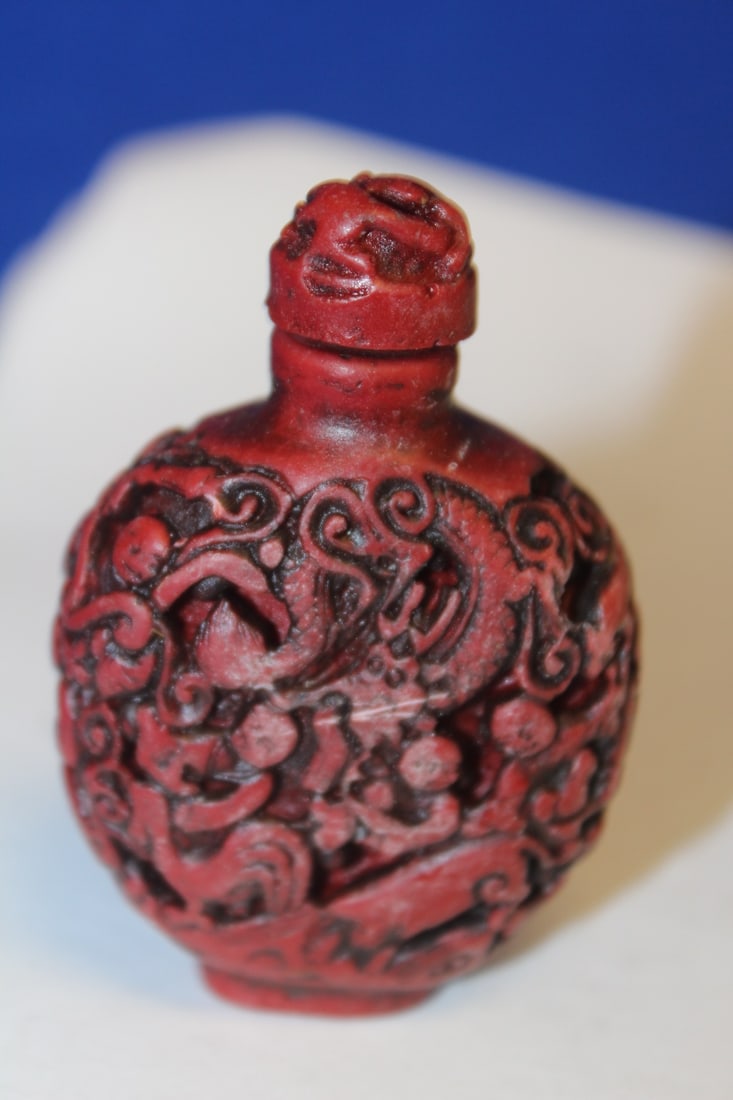 A Carved Resin Snuff Bottle: 3" tall