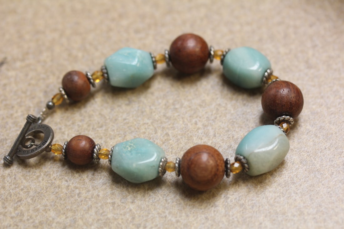 Marked Sterling with Glass and Wood Bracelet: marked Morgan and Company - marked 925 - inside diameter= 2 1/2" when clapsed