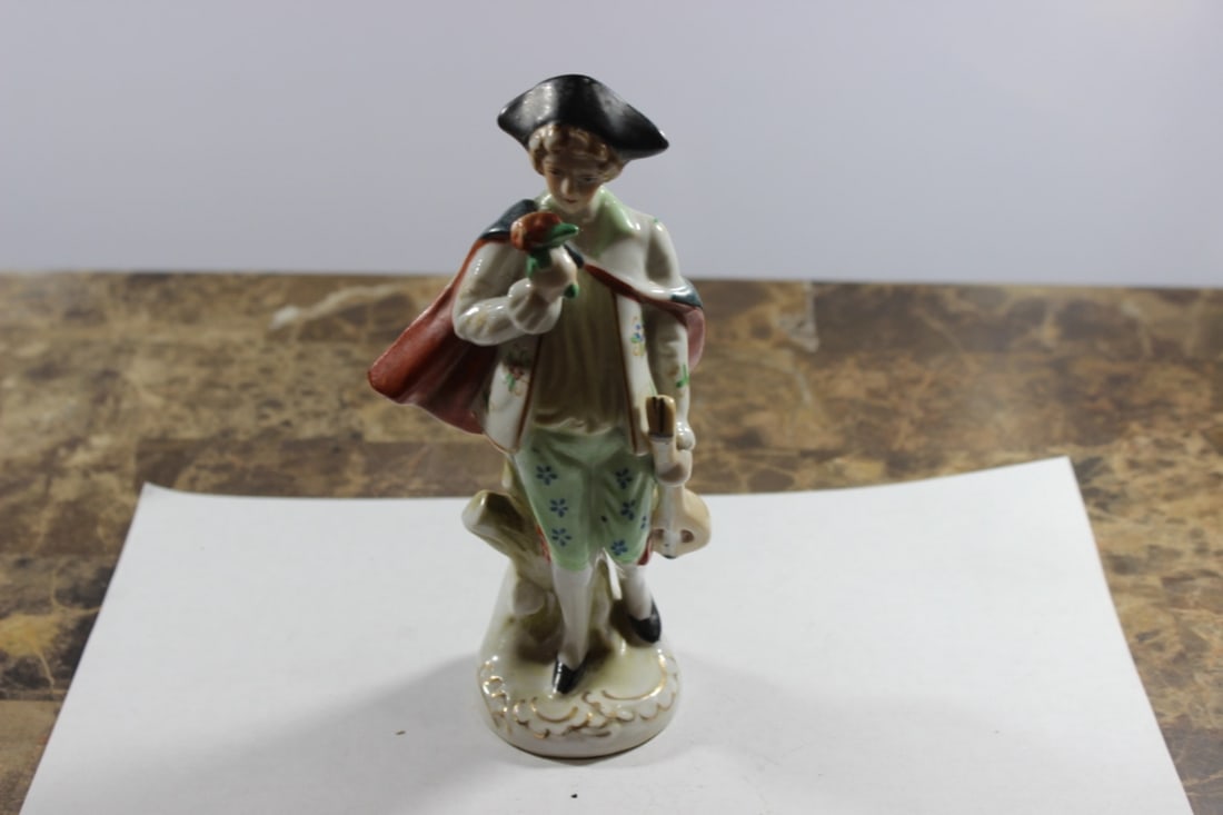 A Japanese Figurine: 7" tall