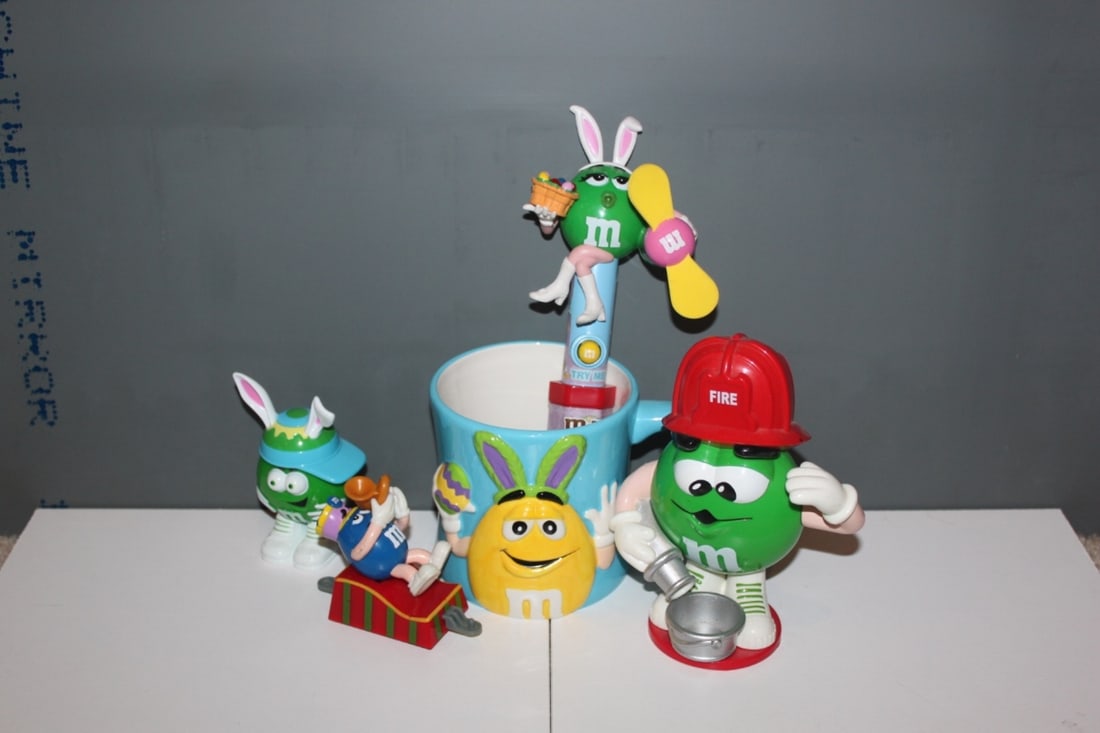 Assorted M&M's Candy Collectables: Green Firefighter, Easter Coffee Mug - also Different Candy Dispensers as shown on photos