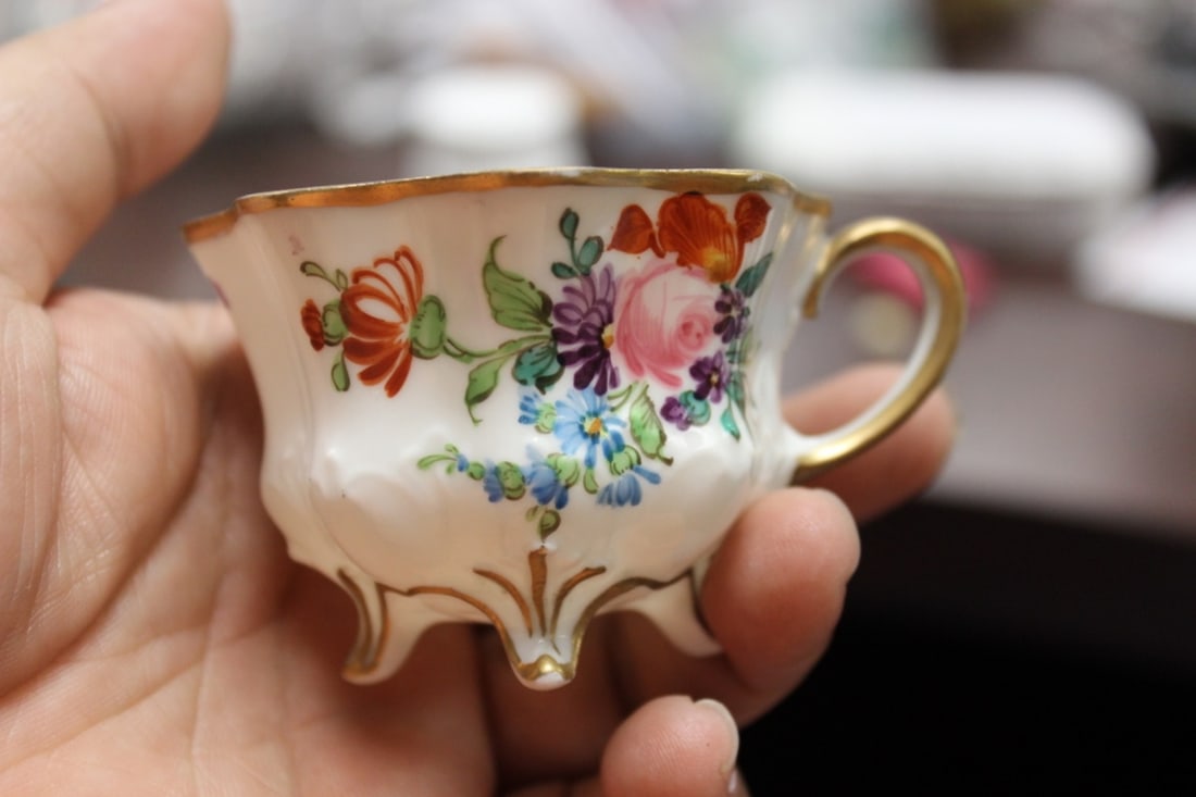 An Antique/Vintage Beehive Dematesse Porcelain Cup: with four legs - marked on the base - 1 3/4" tall - a pretty little cup