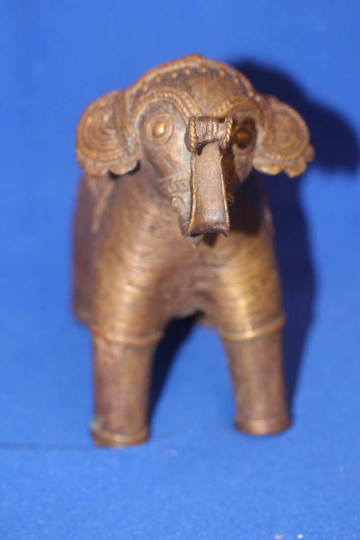 An Antique/Vintage Bronze Elephant: trunk up - 5 1/2" across